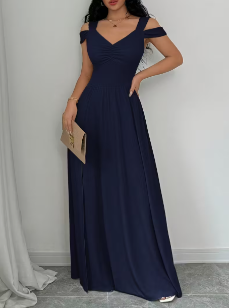 فستان نسائي أنيق بفتحة قصيرة على الفخذ وخصر بارز، وأكمام قصيرة