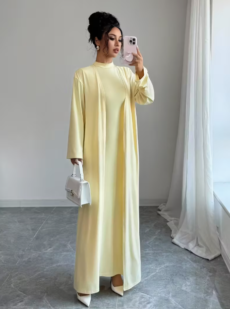 فستان ماكسي بدون أكمام ورقبة عالية + كارديجان بأكمام طويلة متناسق